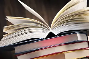 Book Page Composition Impressions: Composition with books on the table