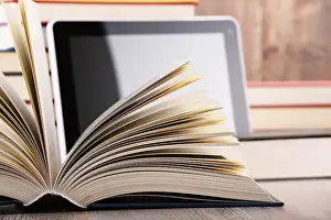 Book Page Composition Impressions: Composition with books and tablet computer on the table