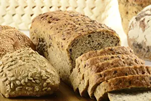 Breakfast Meal Ideas Impressions: Composition with bread and rolls on kitchen table
