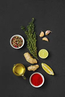 Colorful Vegetarian Dish Impressions: Composition with condiments on black background