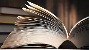 Education Composition Impressions: Composition with open book on the table
