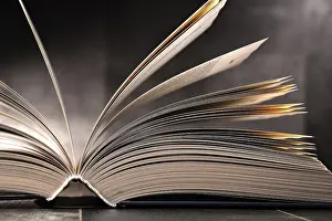 Book Page Composition Impressions: Composition with open book on the table