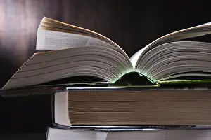 Religious Text Reference Book Impressions: Composition with open book on the table