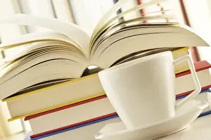 Literature Study Space Impressions: Composition with stack of books and cup of coffee