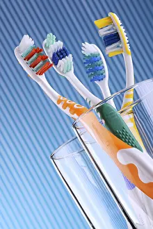 Hygienic Bathroom Scene Impressions: Composition with four toothbrushes