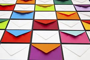 White Envelopes Impressions: Composition with white and colored envelopes on the table
