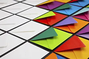 White Envelopes Impressions: Composition with white and colored envelopes on the table