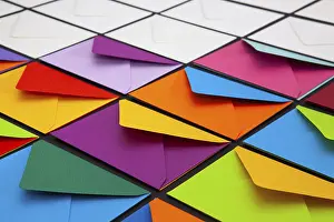 Glazed Tile Background Image Impressions: Composition with white and colored envelopes on the table