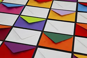 White Envelopes Impressions: Composition with white and colored envelopes on the table