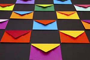 Glazed Tile Background Image Impressions: Composition with white and colored envelopes on the table