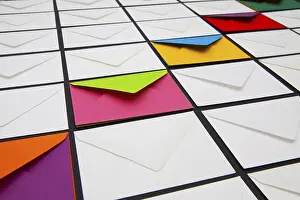 Office Supply Photo Impressions: Composition with white and colored envelopes on the table