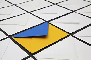 White Envelopes Impressions: Composition with white and colored envelopes on the table