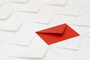 Empty Office Desk Setup Impressions: Composition with white envelopes and one red envelope on the table