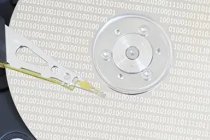 Computer Hardware Details Impressions: Computer hard disk drive with read-write head on the disk