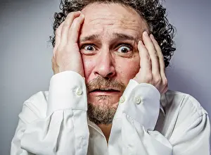 White Shirt Portrait Impressions: Concern for the future, man with intense expression