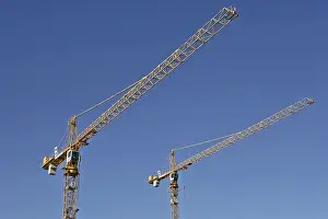 Construction Cranes Impressions: Two construction cranes