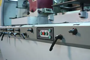 Industrial Machine Impressions: Control panel with buttons and levers on machine