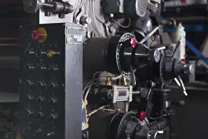 Factory Production Line Impressions: Control panel of typography machine and red buttons