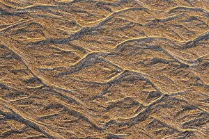 Sandy Beach Structures Impressions: Current marks in the sand, wave pattern in the sand