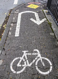 Road Safety Markings Impressions: Cycle path marking on a pavement