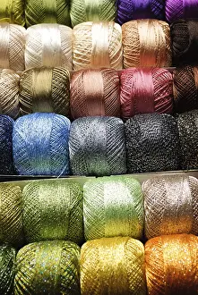 Prismatic Colors Impressions: Different color threads on rows in the store