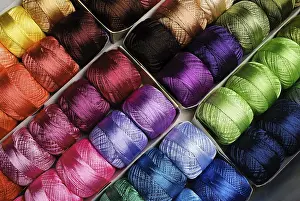 Prismatic Colors Impressions: Different color threads on rows in the store