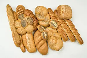 Flour Based Baked Goods Impressions: Different kinds of bread on a studio background