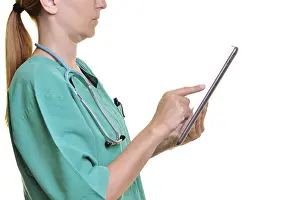 Medical Diagnosis Technology Impressions: Doctor using a tablet computer, cut out