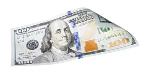 One Hundred Dollar Bill Impressions: One hundred dollar bill falling or floating on empty background