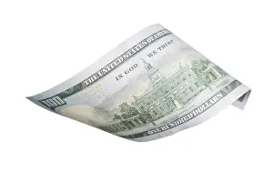 White Background Currency Symbol Impressions: One hundred dollar bill falling or floating on empty background