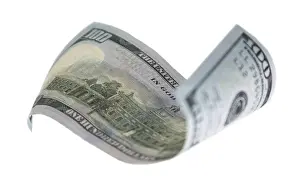 Symbolic Money Concept Impressions: One hundred dollar bill falling or floating on empty background