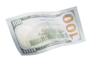 One Hundred Dollar Bill Impressions: One hundred dollar bill falling or floating on empty background