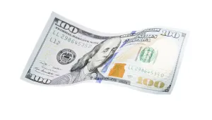 One Hundred Dollar Bill Impressions: One hundred dollar bill falling or floating on empty background