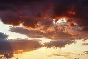 Dramatic Cloud Sky Impressions: Dramatic cloud sky at sunset, orange