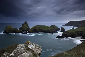 British Weather Forecast Impressions: Dramatic clouds on rocky coast