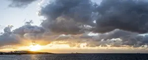 Evening Sun In Greece Impressions: Dramatic clouds at the sea, sunset