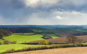 British Countryside Impressions: Dramatic clouds and sky over fields of Berry Pomeroy