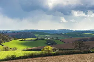British Countryside Impressions: Dramatic clouds and sky over fields of Berry Pomeroy