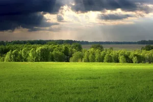 Cloudscape Photography Impressions: Dramatic cloudscape over village landscape