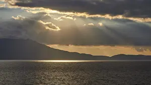 Dramatic Evening Sky Impressions: Dramatic cloudy evening sky, sun rays breaking through clouds