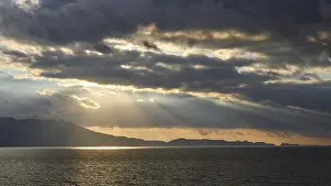 Southeast Europe Landscapes Impressions: Dramatic cloudy evening sky, sun rays breaking through clouds