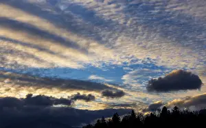 Evening Sun Europe Impressions: Dramatic cloudy sky, cirrus clouds at sunset