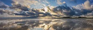 Low Tide Photography Impressions: Dramatic cloudy sky with low