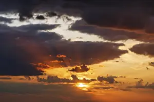 Sweden Landscape Photography Impressions: Dramatic cloudy sky at sunset, sunbeams