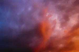 Cloudy Evening Atmosphere Impressions: Dramatic cloudy sky against thunderstorm