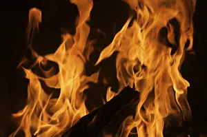 Plain Dark Colored Background Impressions: Dramatic flames against A dark background