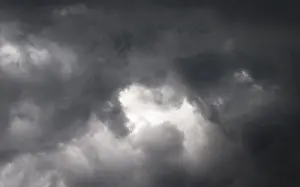 Cloudy Atmospheric Light Impressions: Dramatic lighting mood with dark thunderclouds