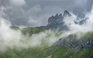 Mountainous Region Switzerland Impressions: Dramatic mountain landscape with clouds