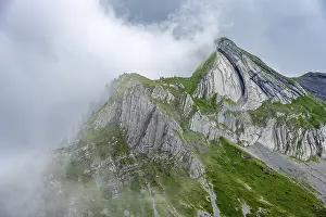 Cloudy Mountain Peak Impressions: Dramatic mountain landscape with clouds
