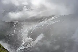 Dramatic Mountain Landscape Impressions: Dramatic mountain landscape covered in clouds